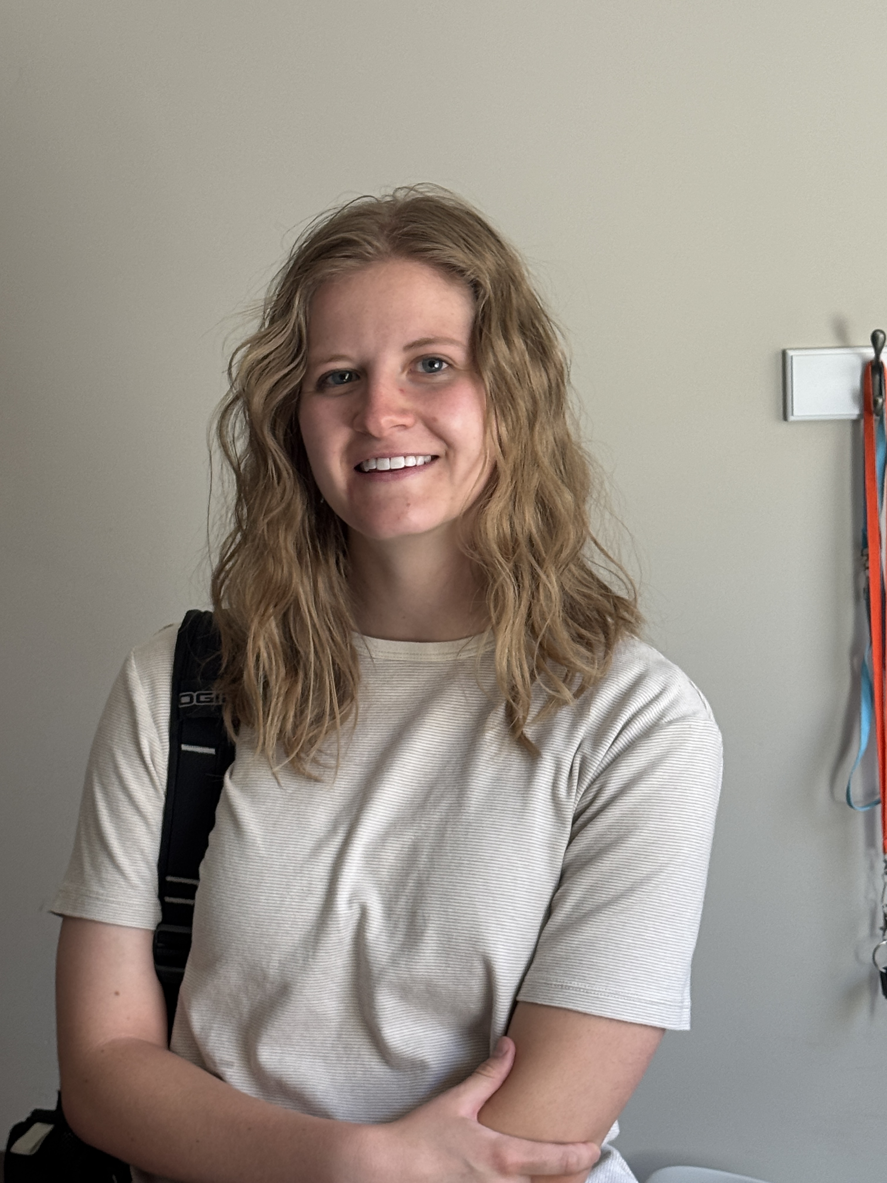 Callie guiding a choir rehearsal